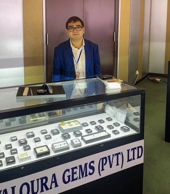 Valoura Gems (Pvt) Ltd exhibition booth with gemstone display case